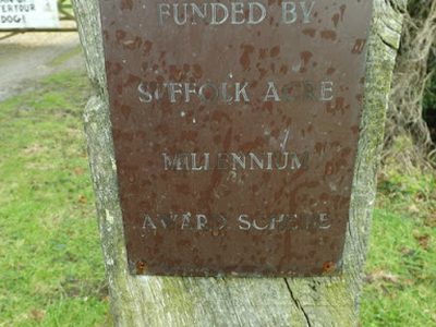 Plaque on Bedfield and Monk Soham sports field sign