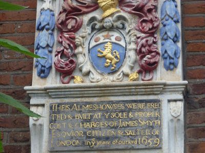 Plaque over the entrance to the Smyth Almshouses