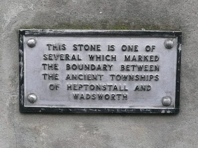Plaque above township boundary stone