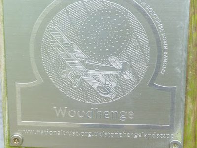 Woodhenge plaque on gatepost