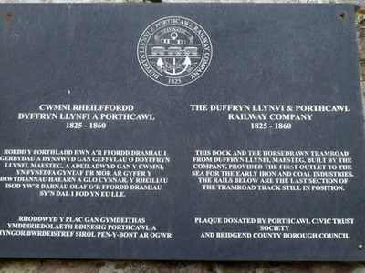 Plaque behind a remnant of tramroad track, Porthcawl