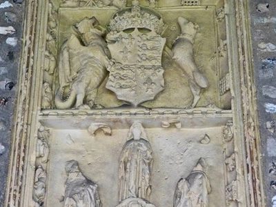 Royal Arms of Henry VII plaque in the cloisters