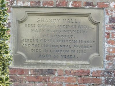 Plaque  over  front  door  of  Shandy  Hall