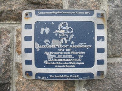 Blue plaque on the bank