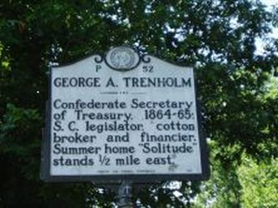 GEORGE A. TRENHOLM
