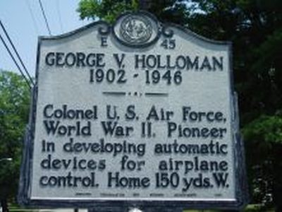 GEORGE V. HOLLOMAN 1902-1946
