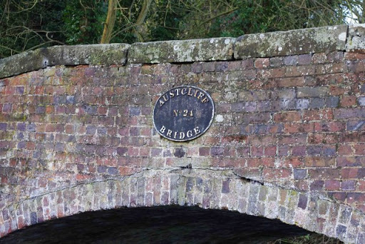 Name and number plaque on Austcliff Bridge near Caunsall